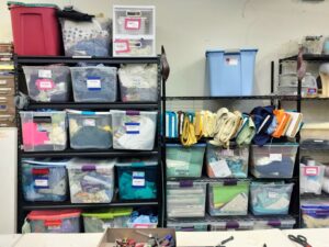 Shelves containing hackable fabric